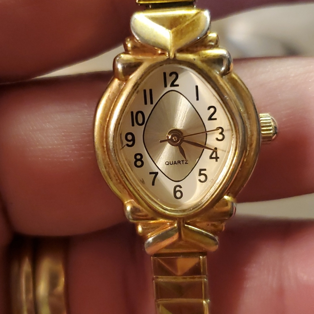 Gold tone watch